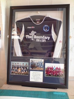 Custom photo window shirt framing with info window. Presented to The Boundary by Baston FC with thanks.