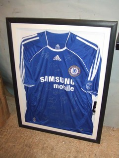 Chelsea signed football shirt framing.