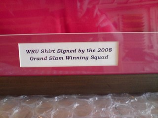 WRU signed rugby shirt by the 2008 grand slam winning squad.